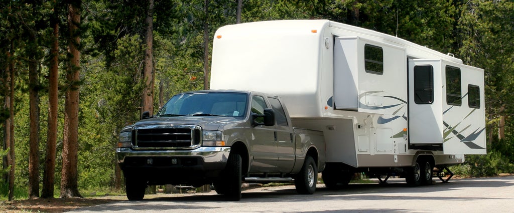 truck pulling an white RV