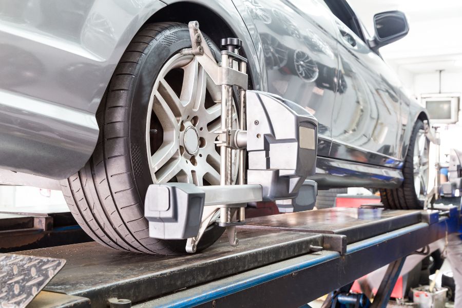 Sizing the rims and tires of a vehicle at a service center in Foothills & Chinook, Calgary